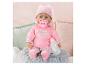 Babypop met roze kleding, speen en fles