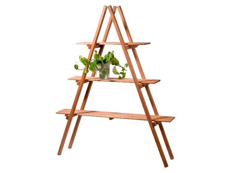 Houten plantenrek met drie planken, met een groene potplant.