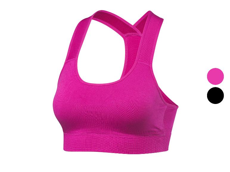 Roze sportbeha met racerback bandjes, met twee kleurcirkels ernaast.