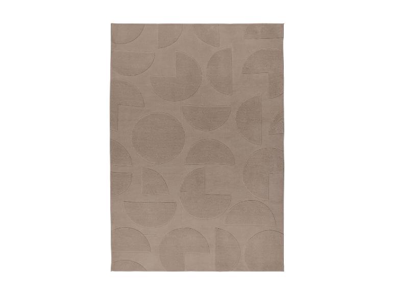 Beige rechthoekig vloerkleed met een geometrisch patroon van cirkels en halve cirkels.