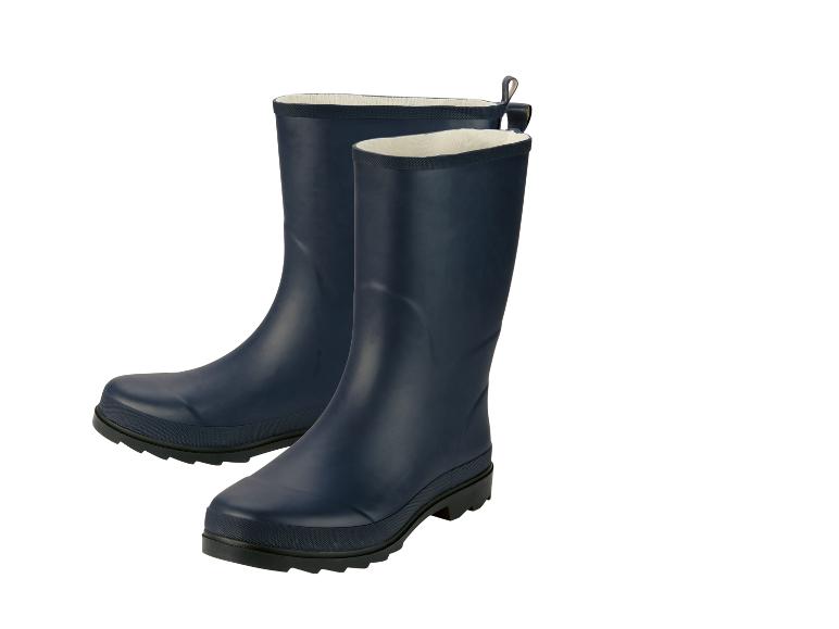 Een paar donkerblauwe regenlaarzen met witte voering.