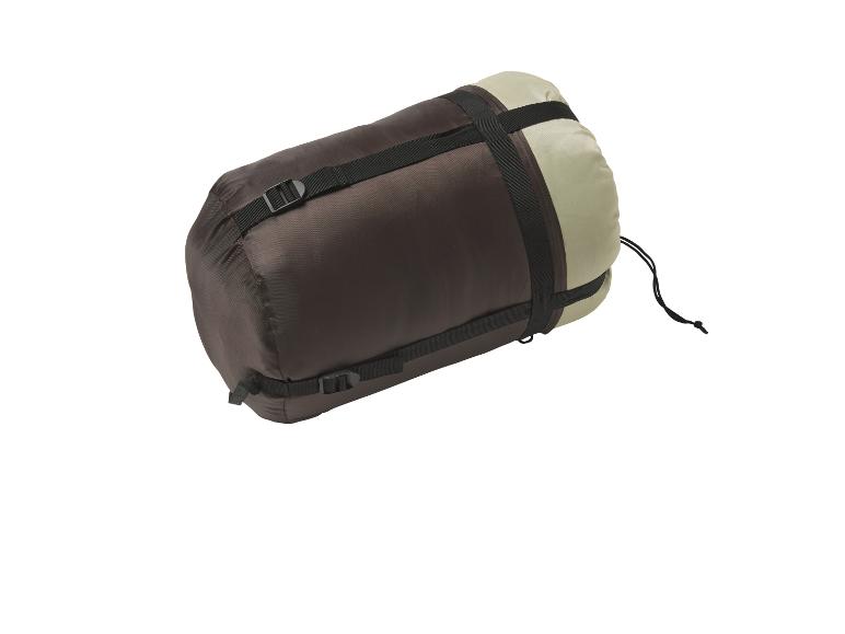 Opgerolde bruin-beige slaapzak met compressiebanden