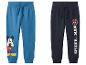 Twee kinder joggingbroeken: blauw met Mickey Mouse en donkerblauw met Spider-Man.