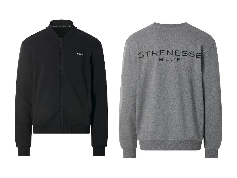 Zwart jack met rits en grijs sweatshirt met de tekst 