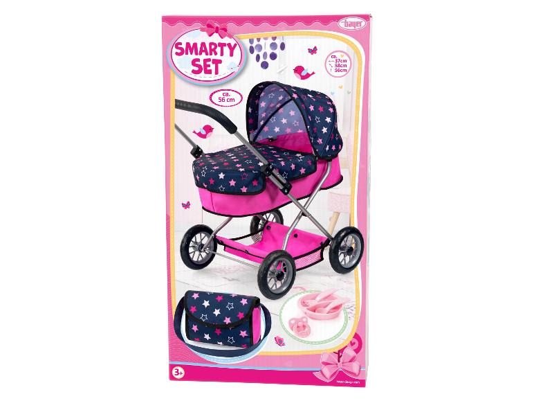 Een roze poppenwagen met sterretjes print van Bayer Design.