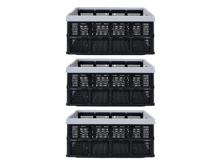 Drie zwarte opvouwbare kratten met grijze randen, op elkaar gestapeld.