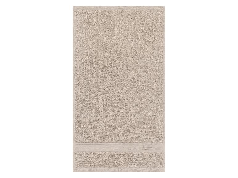 Beige badhanddoek van badstof.