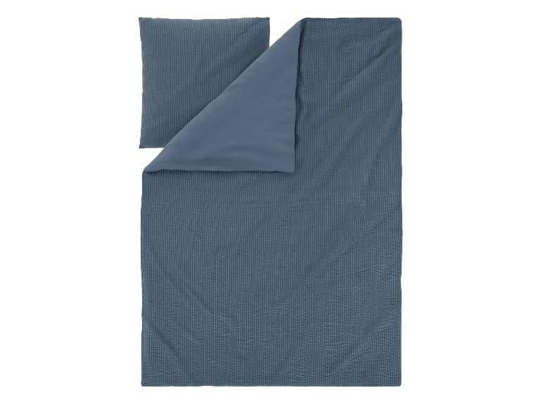 Donkerblauw dekbedovertrek en kussensloop set met een subtiel streepmotief.