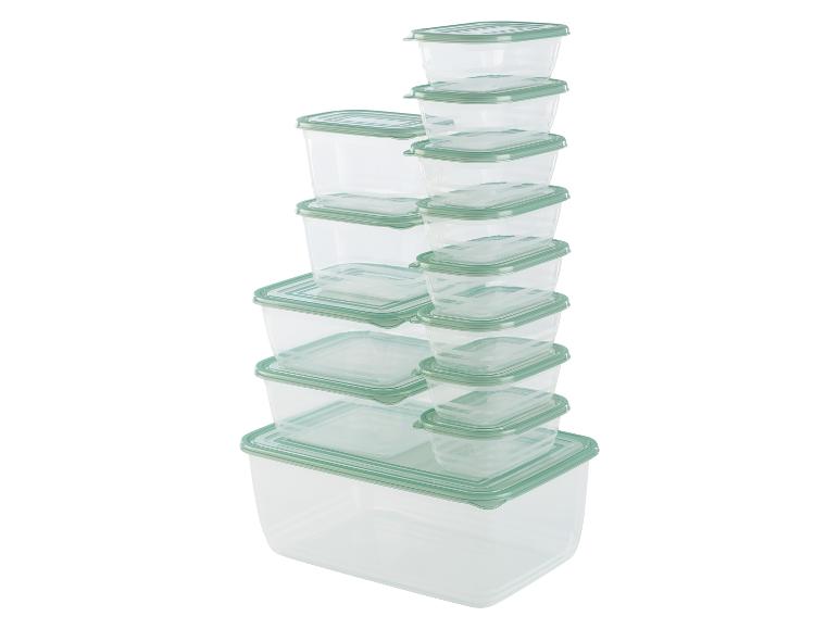 Stapelbare, transparante plastic voedselcontainers met groene deksels.