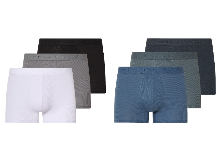 Drie Esmara katoenen boxershorts in zwart, grijs en wit.