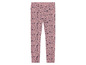Roze leggings met bloemenprint.