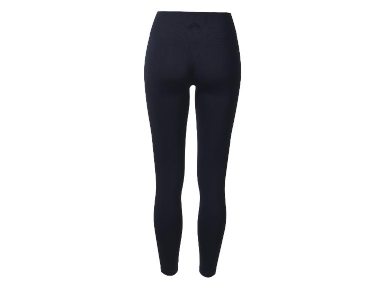Donkerblauwe naadloze dameslegging met hoge taille, achteraanzicht.