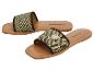 Platte sandalen met brede band met zwart-wit geometrisch patroon.