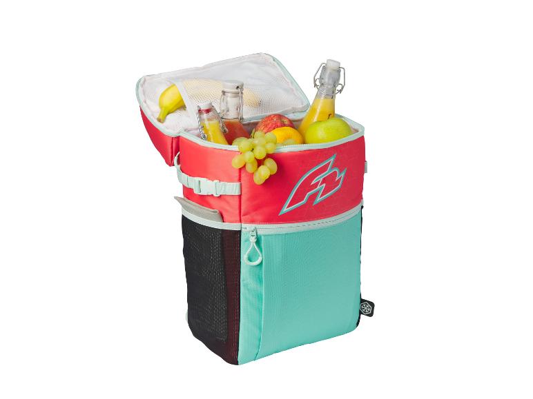 Isothermische tas met fruit en sap, perfect voor een picknick.