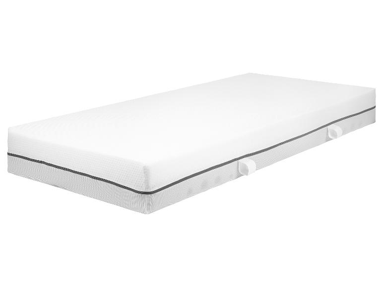 Een wit matras met grijze details.