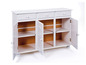 Witte dressoir met drie laden en twee deuren.