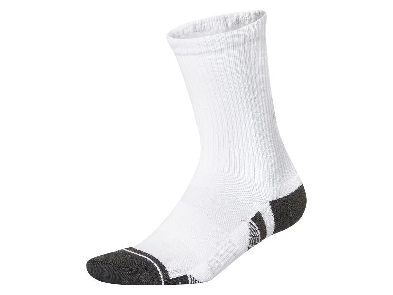 Een witte kniekous met donkergrijze accenten op de tenen en de hiel.