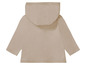Beige baby hoodie met lange mouwen.