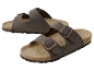 Twee bruine sandalen met dubbele bandjes.