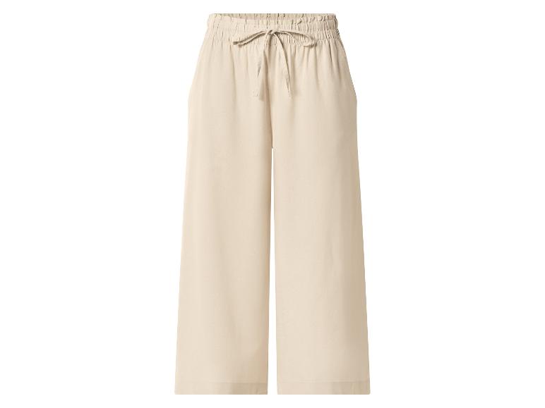 Beige wijde broek met elastische tailleband en trekkoord.