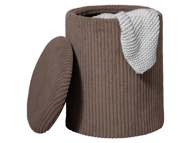 Ronde bruine corduroy opbergmand met deksel en witte gebreide deken