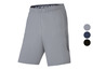 Grijs Under Armour sportbroek met zwarte accenten.