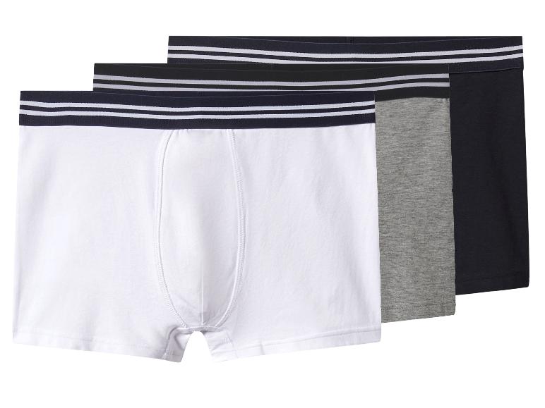 Drie herenboxershorts in wit, grijs en zwart met gestreepte taillebanden.