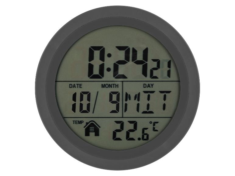 Ronde digitale klok die tijd, datum en temperatuur weergeeft.