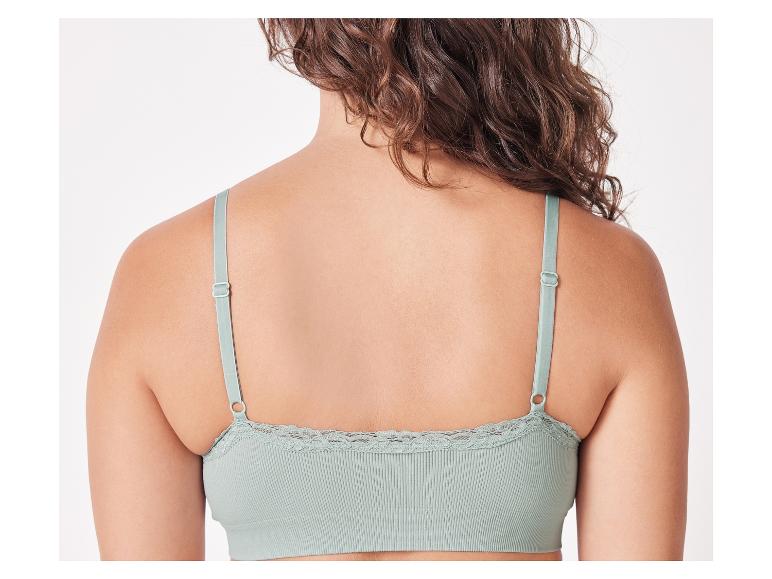 Een groene, naadloze beha met kant.