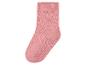 Een roze geribbelde sok op een witte achtergrond.