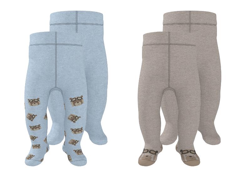 Twee paar babypanty's, één blauw met beren en één beige met berengezichten op de voeten.