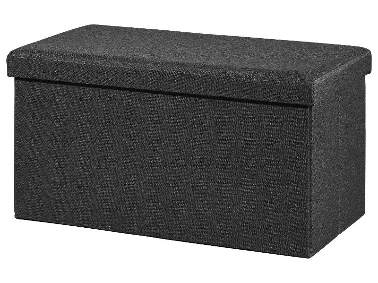 Donkergrijze opbergkruk van stof.