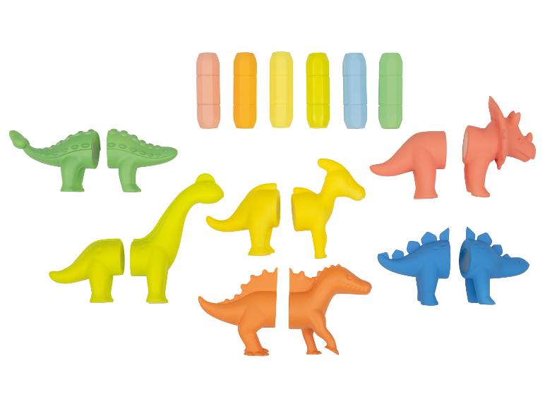 Set kleurrijke dinosaurus speelgoed met verwisselbare onderdelen en opbergcapsules.