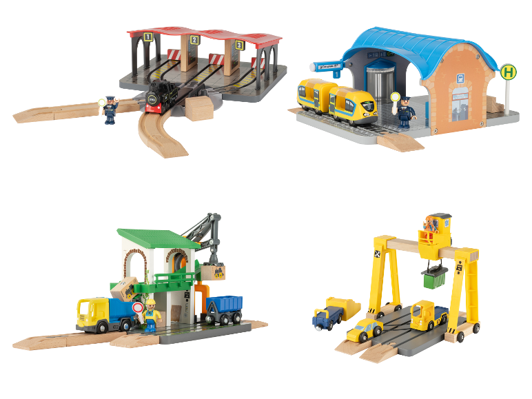 Houten treinset met treinstation, laadstation en kraan.