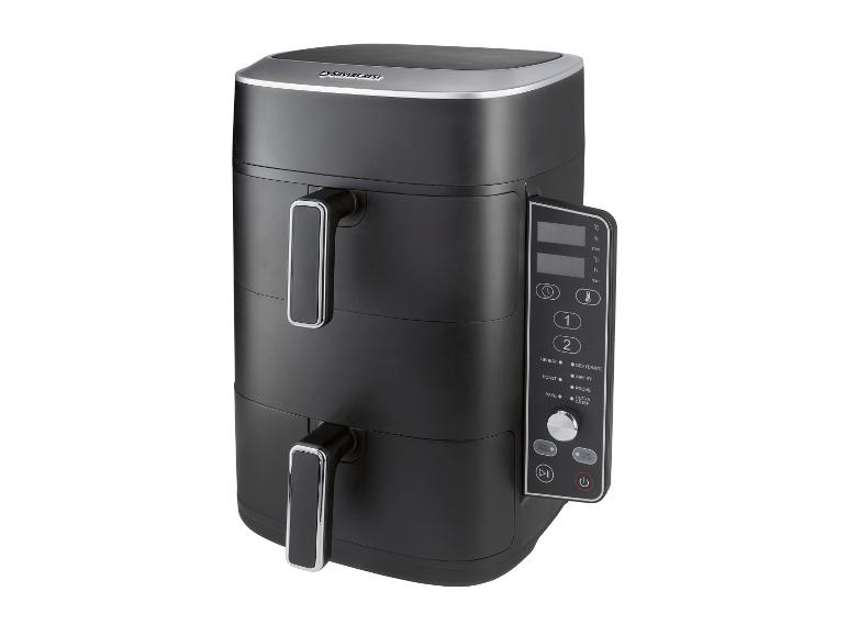Zwarte dubbele heteluchtfriteuse met digitaal display en meerdere kookfuncties.