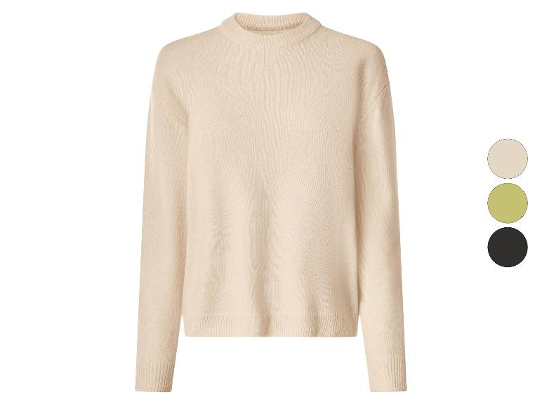 Beige gebreide trui met ronde hals en drie kleurstalen.