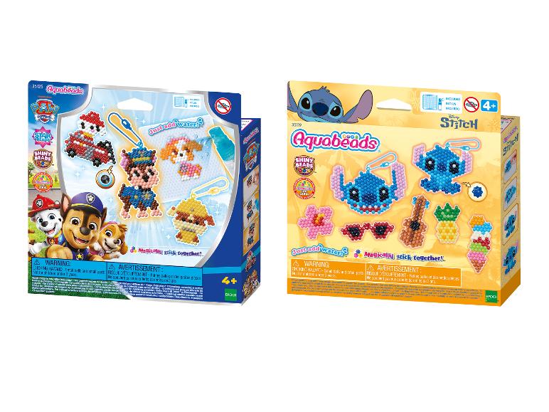 Twee Aquabeads sets, één met Paw Patrol figuren en de andere met Disney Stitch.