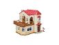 Speelgoedpoppenhuis met rood dak, balkon en brievenbus.