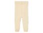Beige geribbelde gebreide leggings voor baby's.