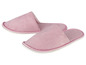 Twee roze badslippers met een witte zool.