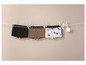 Drie boxershorts met een graafmachine-print hangen aan een waslijn.