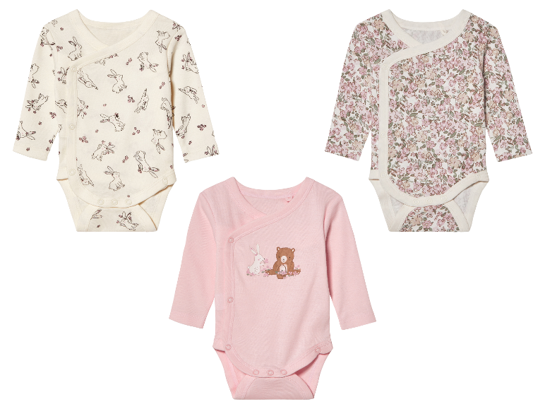 Drie schattige baby-body's met wikkelknoop.
