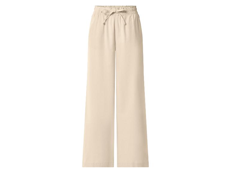 Beige wijde broek met elastische tailleband en trekkoord.
