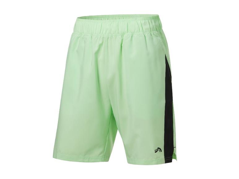 Lichtgroene sportshorts met zwarte details.