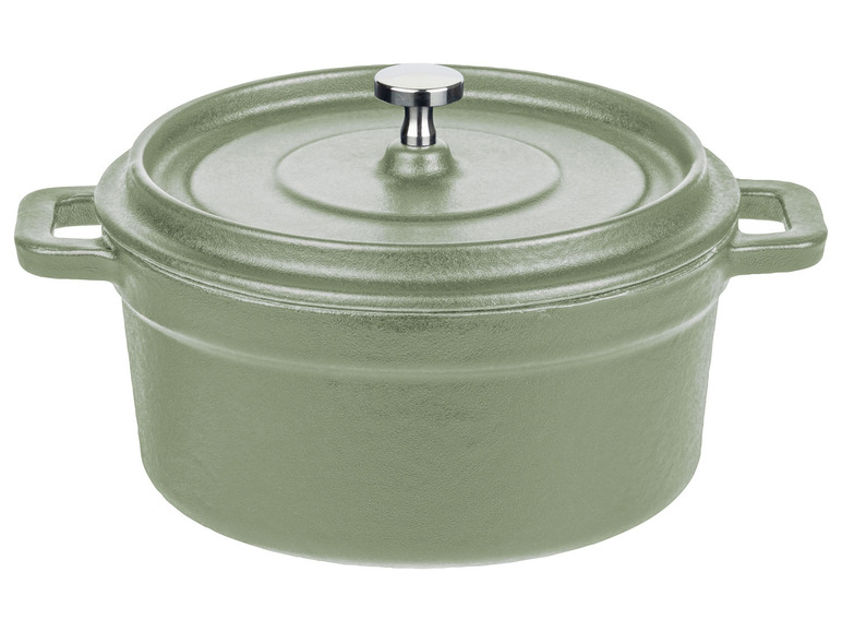 Een groene gietijzeren braadpan met deksel.