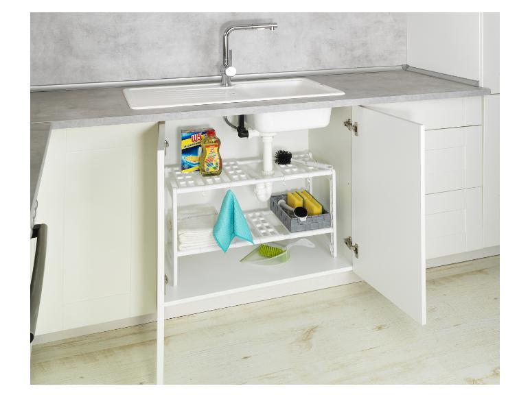 Opbergrek onder de gootsteen met W5 producten.