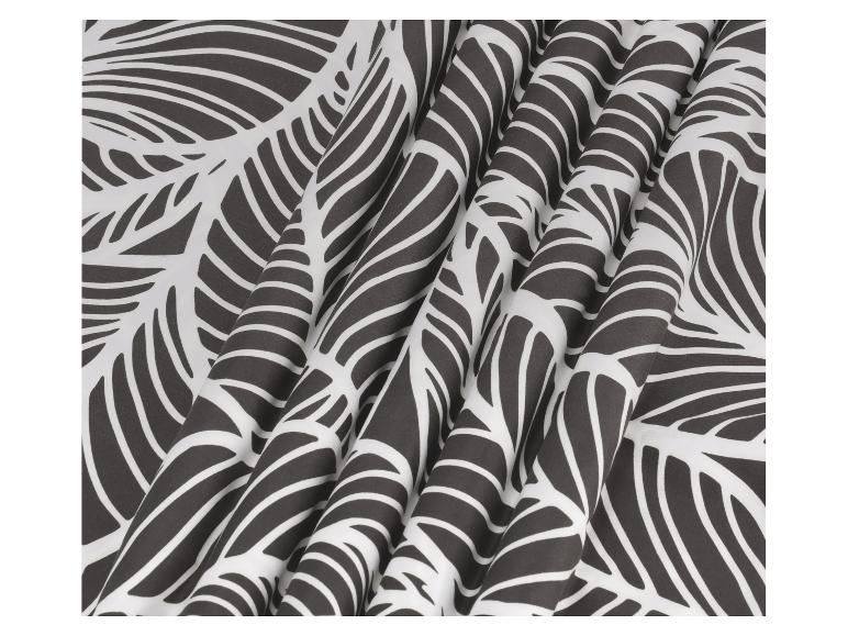 Donkergrijs en wit textiel met bladmotief.