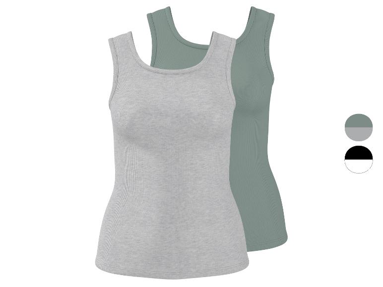 Twee geribbelde tanktops, één lichtgrijs en één saliegroen, met kleurstalen.