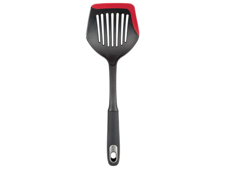 Een zwarte spatel met een rode rand en een metalen handvat.