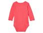 Koraalroze baby body met lange mouwen.